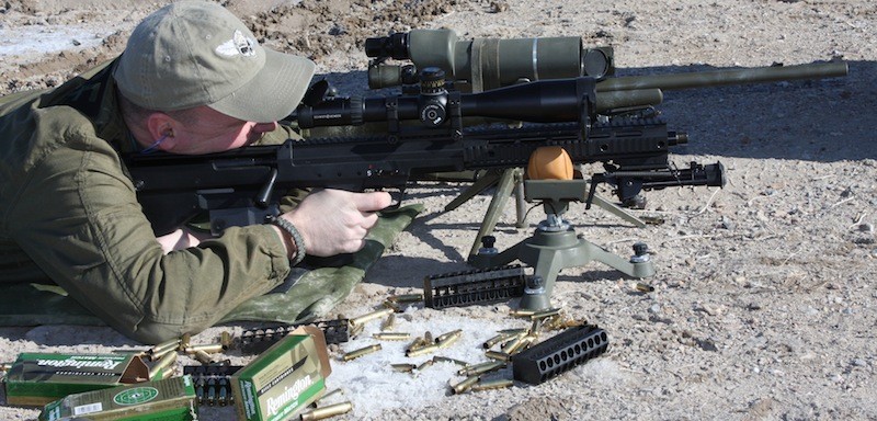 .308 ammo at the shooting range Sniper firing .308 ammunition at a shooting range