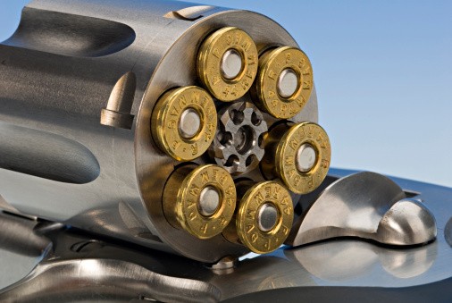 44 magnum ammo in a revolver Revolver with 44 magnum ammunition in the chamber.